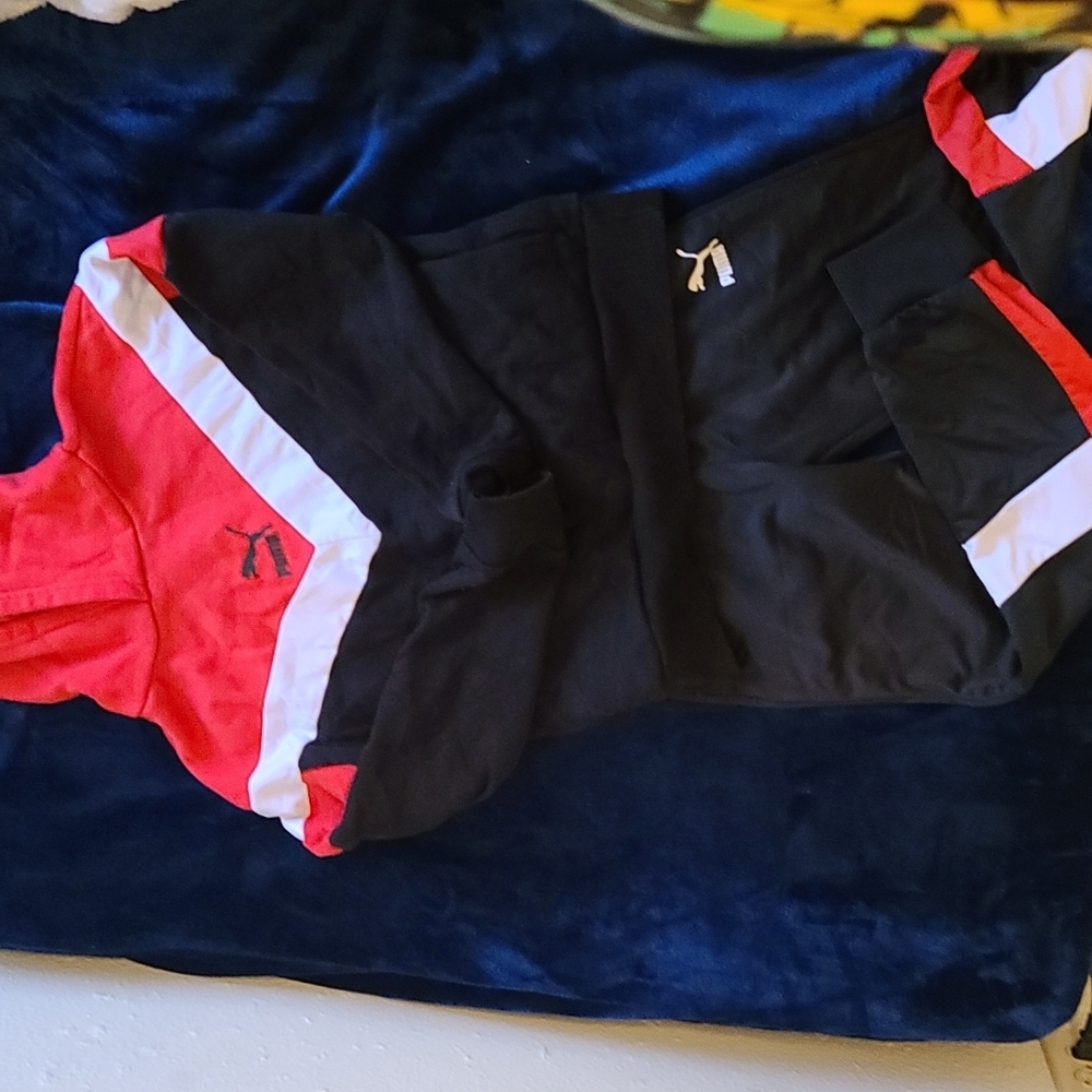 Kids colorblock Puma hoodie and track pants.